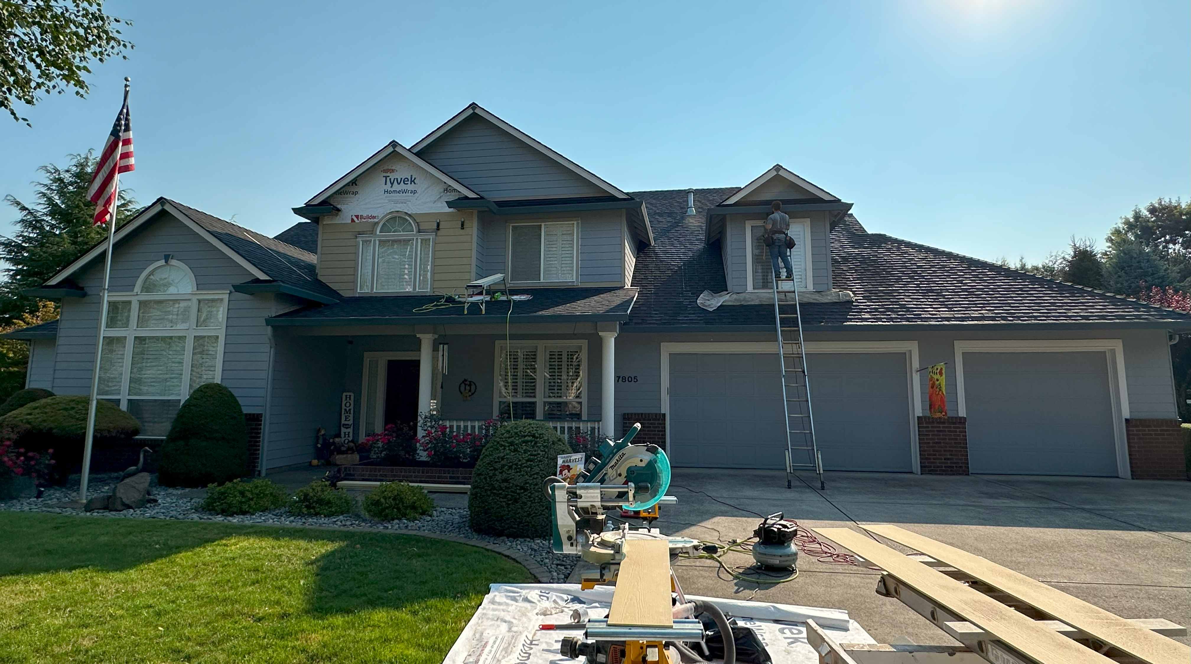 Home undergoing professional window installation